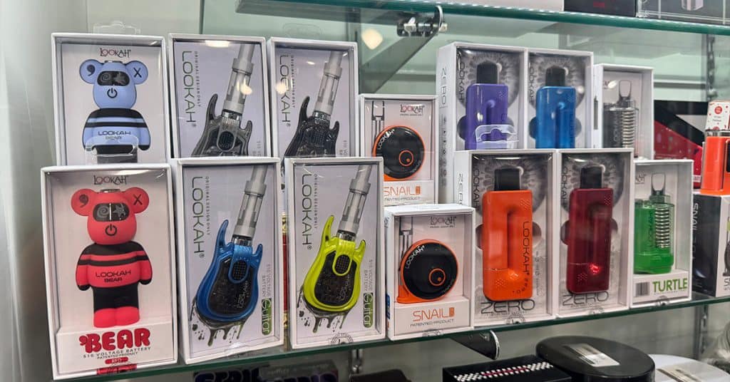 It’s All Goodz Smoke Shop in Phoenix featuring disposable vapes, PuffCo products, and glass accessories