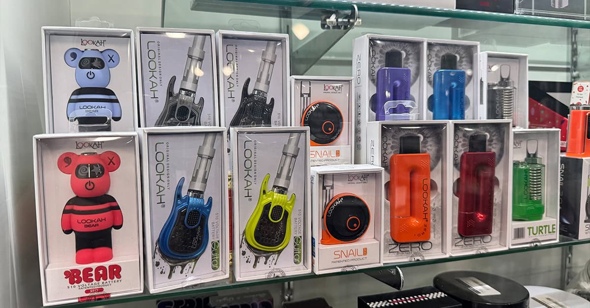 It’s All Goodz Smoke Shop in Phoenix featuring disposable vapes, PuffCo products, and glass accessories